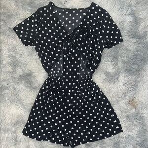 Black and White Polka Dot Jumpsuit with V-Neck and Open Front